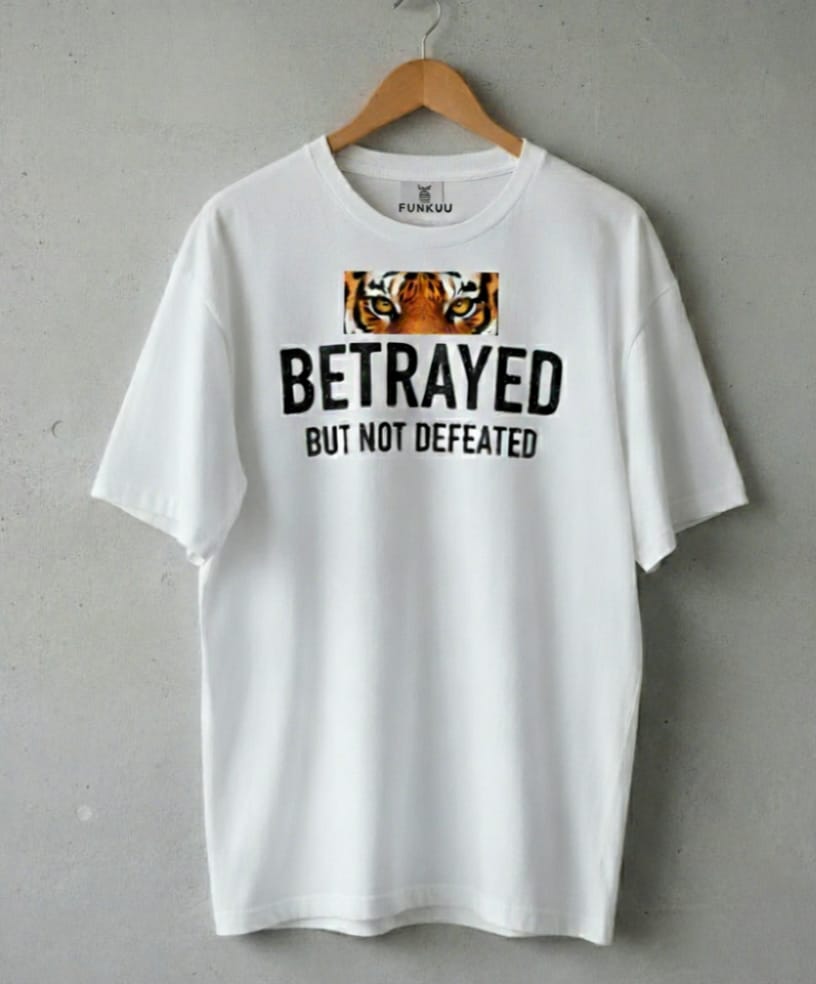 BETRAYED BUT NOT DEFEATED Oversized White T-Shirt | Tiger Eye Resilience Tee